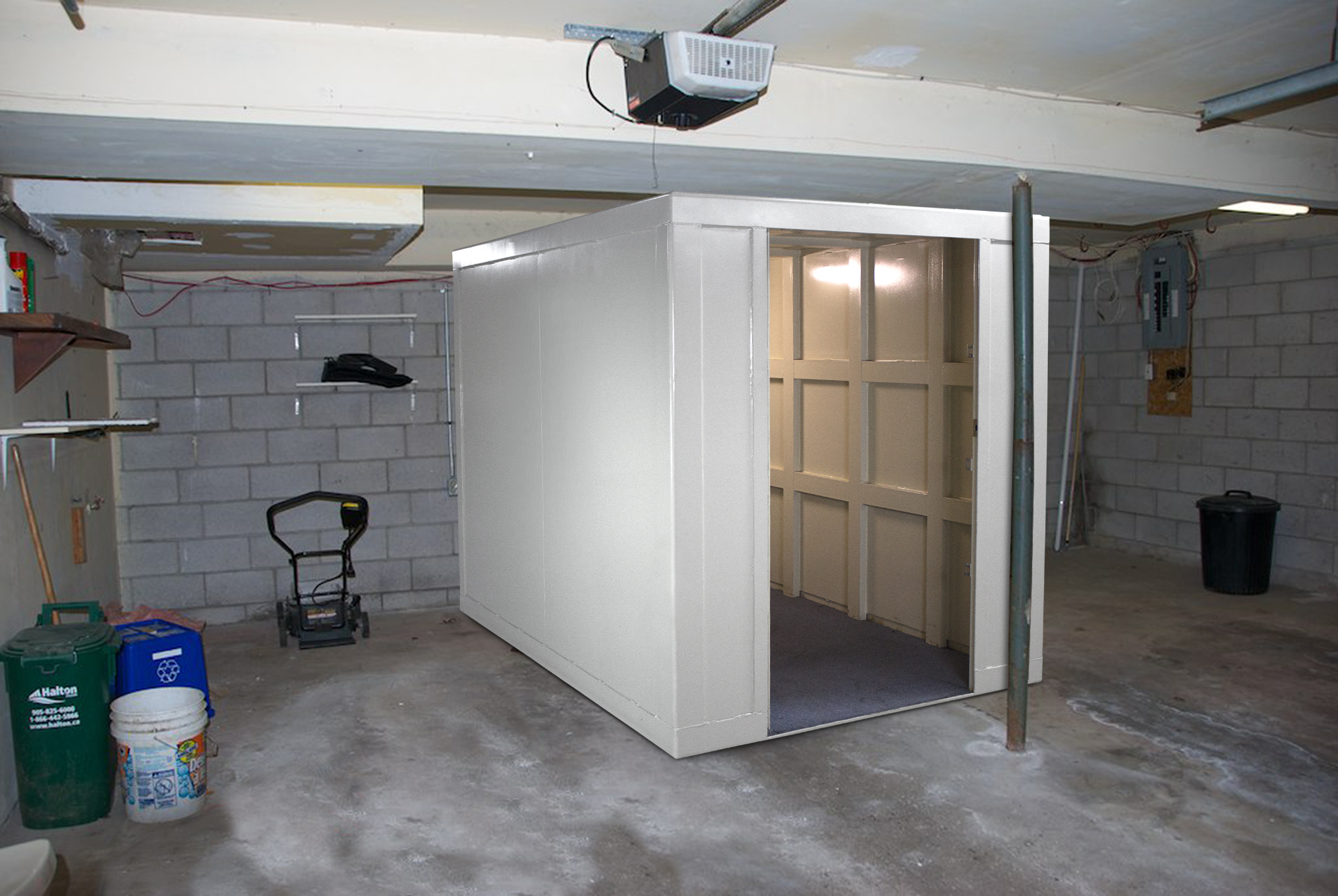 8459744538_da95b17d18_o-1BD Safe room in a basement, with lawn mower and lawn equipment.