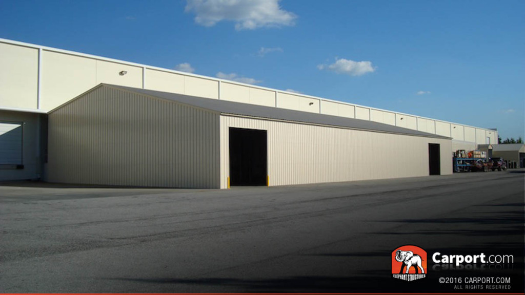 Commercial metal warehouse with two frame-outs for entry and exit.