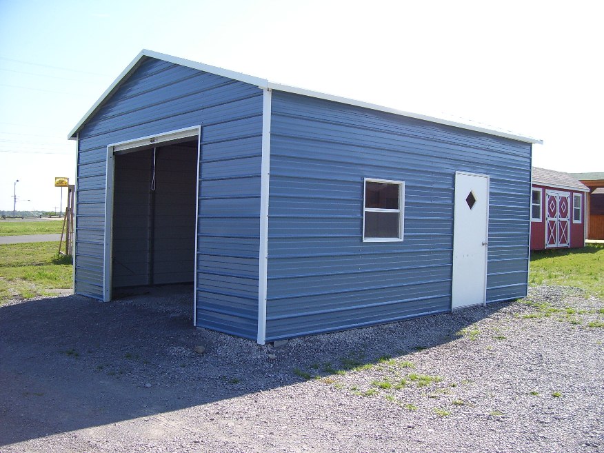 deluxe-one-car-steel-garage Deluxe one car steel garage with one roll up garage door and one walk-in door.